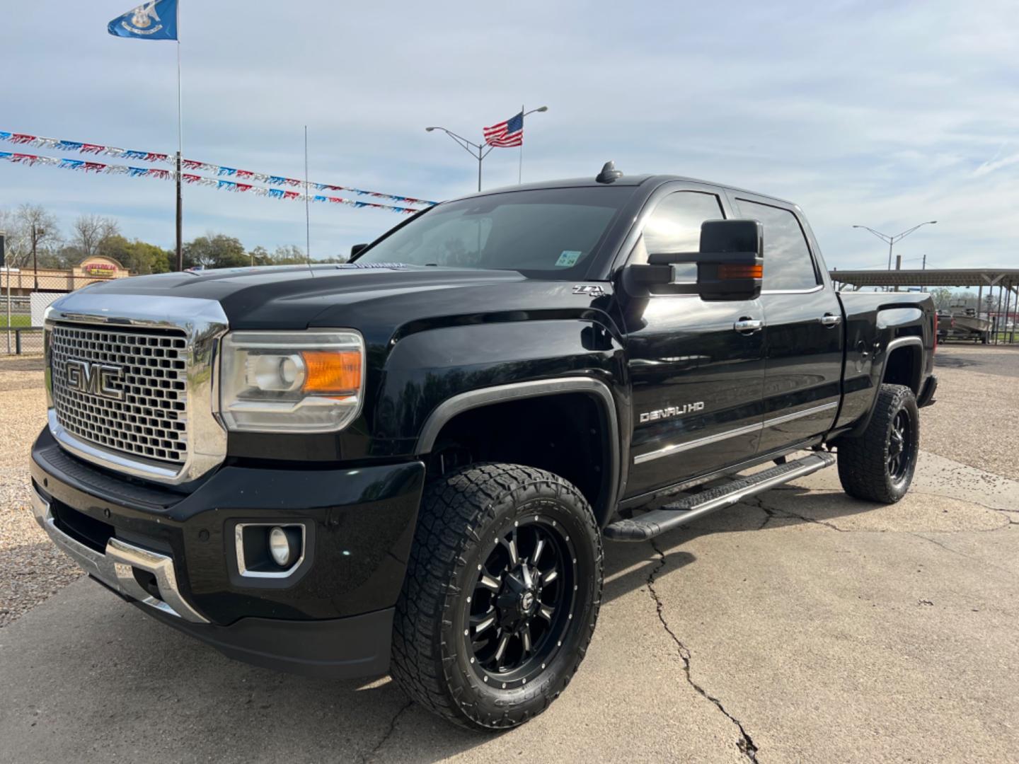 2015 Black /Tan GMC Sierra 2500HD Denali (1GT120E88FF) with an 6.6L Duramax Diesel engine, Allison Transmission transmission, located at 4520 Airline Hwy, Baton Rouge, LA, 70805, (225) 357-1497, 30.509325, -91.145432 - 2015 GMC Sierra 2500HD Crew Cab Denali 4WD 6.6 Duramax Diesel (Deleted), Allison Transmission, 211K Miles, Heated & Cooled Leather Seats, All Power, Backup Camera, Tow Pkg. NO IN HOUSE FINANCING. FOR INFO PLEASE CONTACT JEFF AT 225 357-1497 CHECK OUT OUR A+ RATING WITH THE BETTER BUSINESS BUREAU - Photo#0